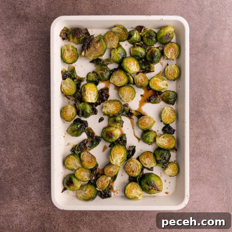 Maple-Balsamic Roasted Brussels Sprouts Recipe for Fall sides 14 Roasted brussels sprouts tossed in maple syrup and balsamic vinegar