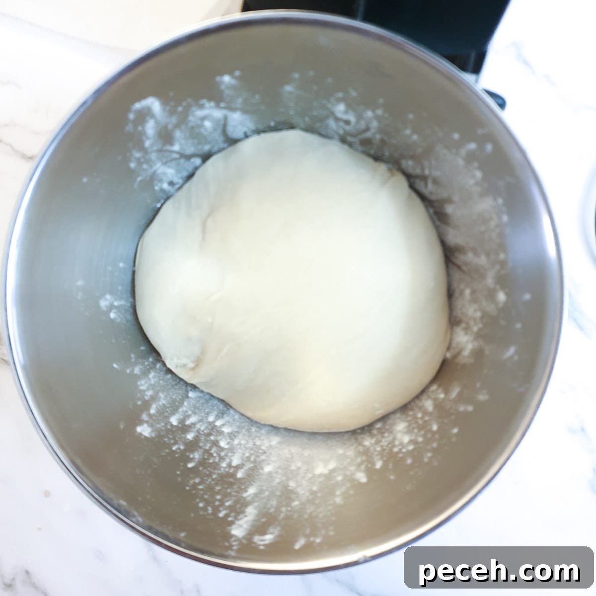 Mosbolletjies (Condensed Milk Rusks): South African Sweet Biscuits 8 A ball of dough before it has risen.
