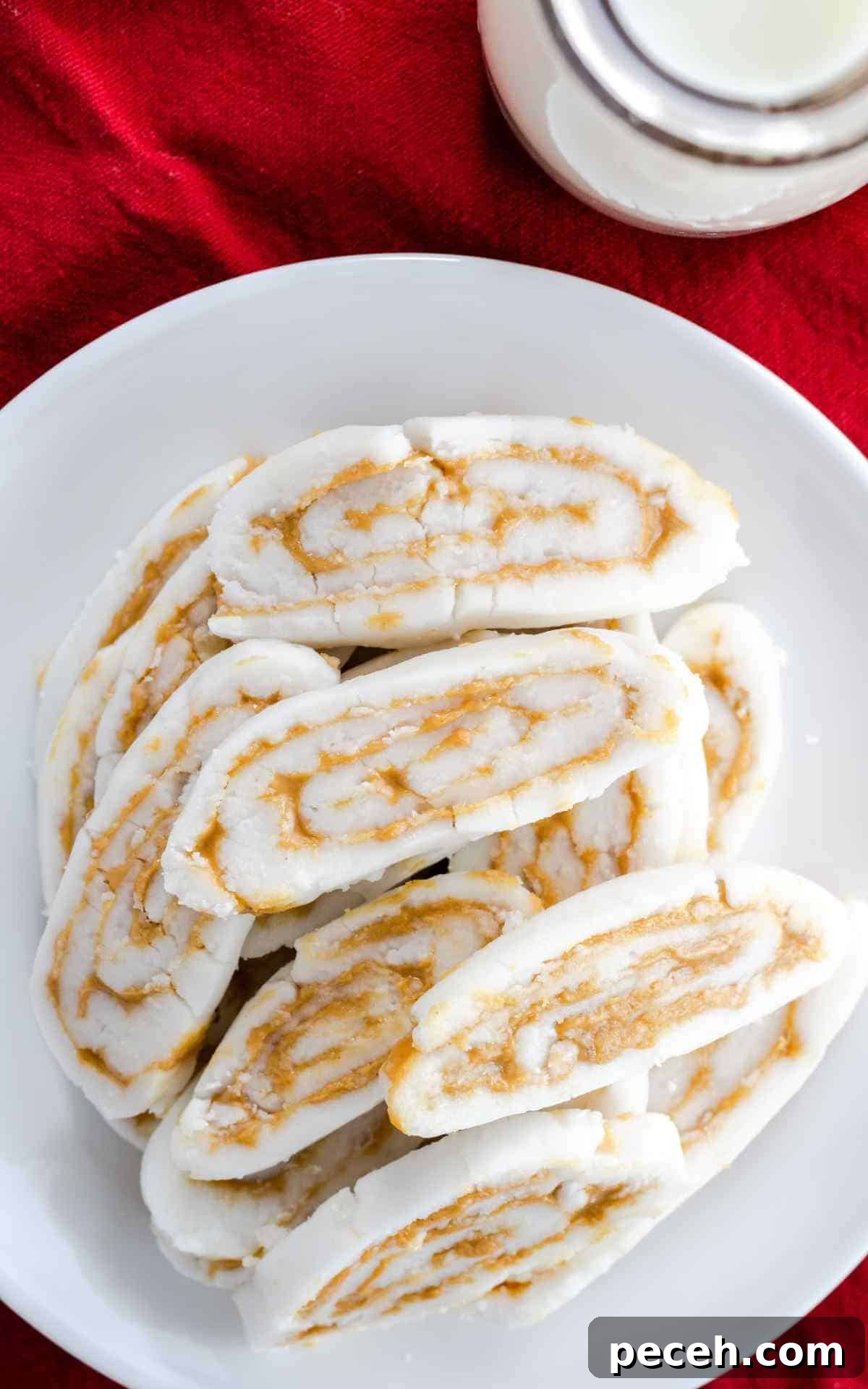 Old Fashioned potato candy stacked on a plate.
