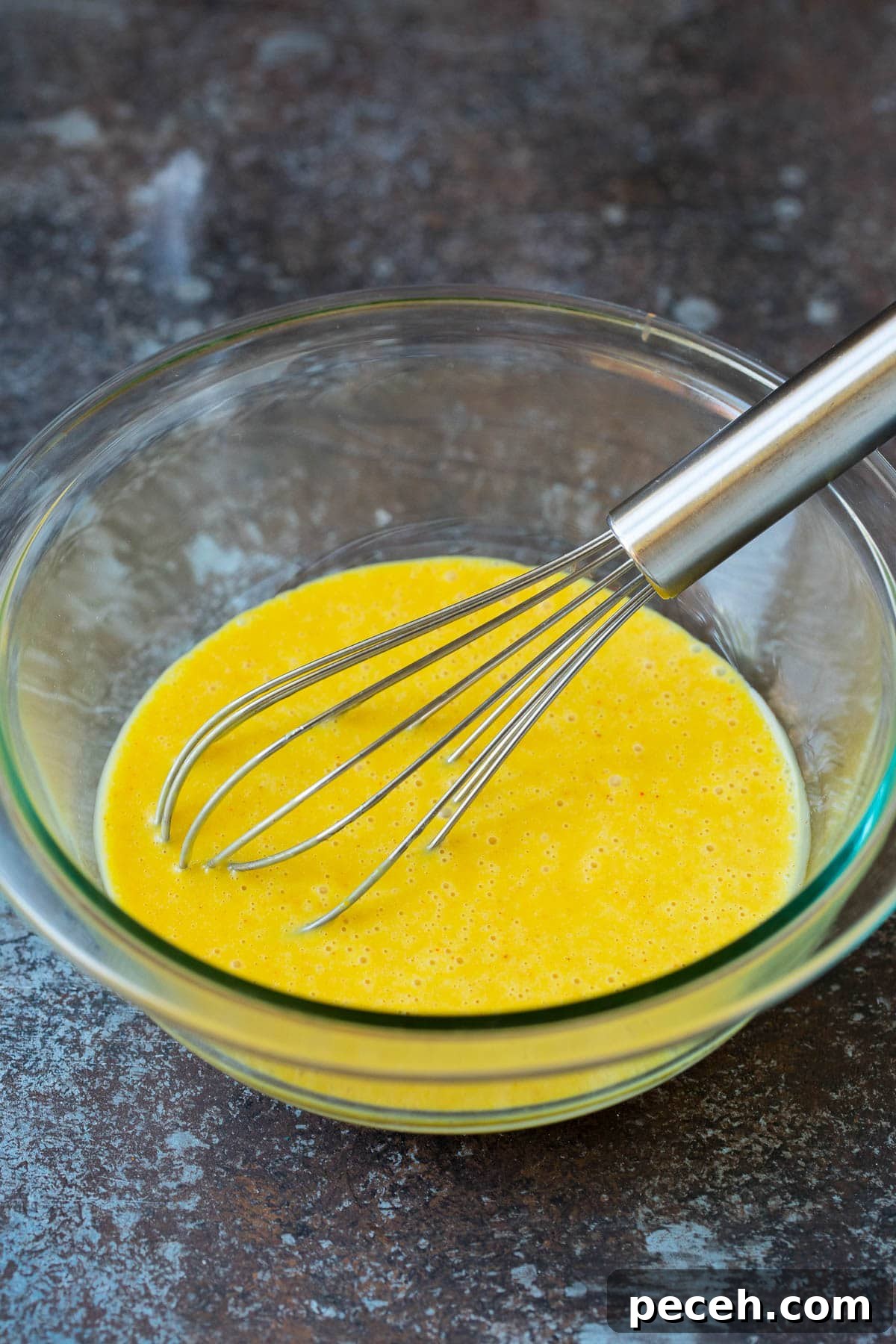 Homemade Honey Mustard Sauce Recipe for Dipping and Dressing 4 A whisk in a bowl of honey mustard.