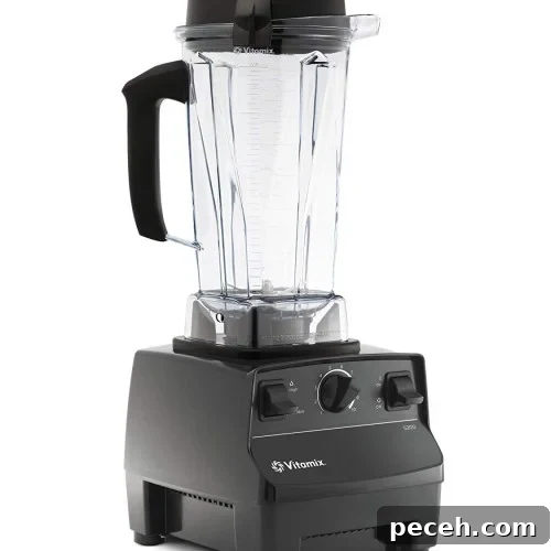 A black Vitamix blender with a clear plastic pitcher