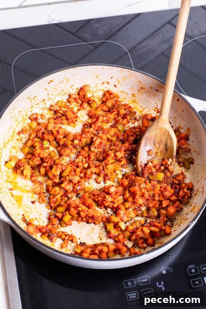 Braised Beef Short Rib Ragu Recipe — Slow-Cooked Italian Comfort 6 The soffrito shown caramelized along with garlic and tomato paste.