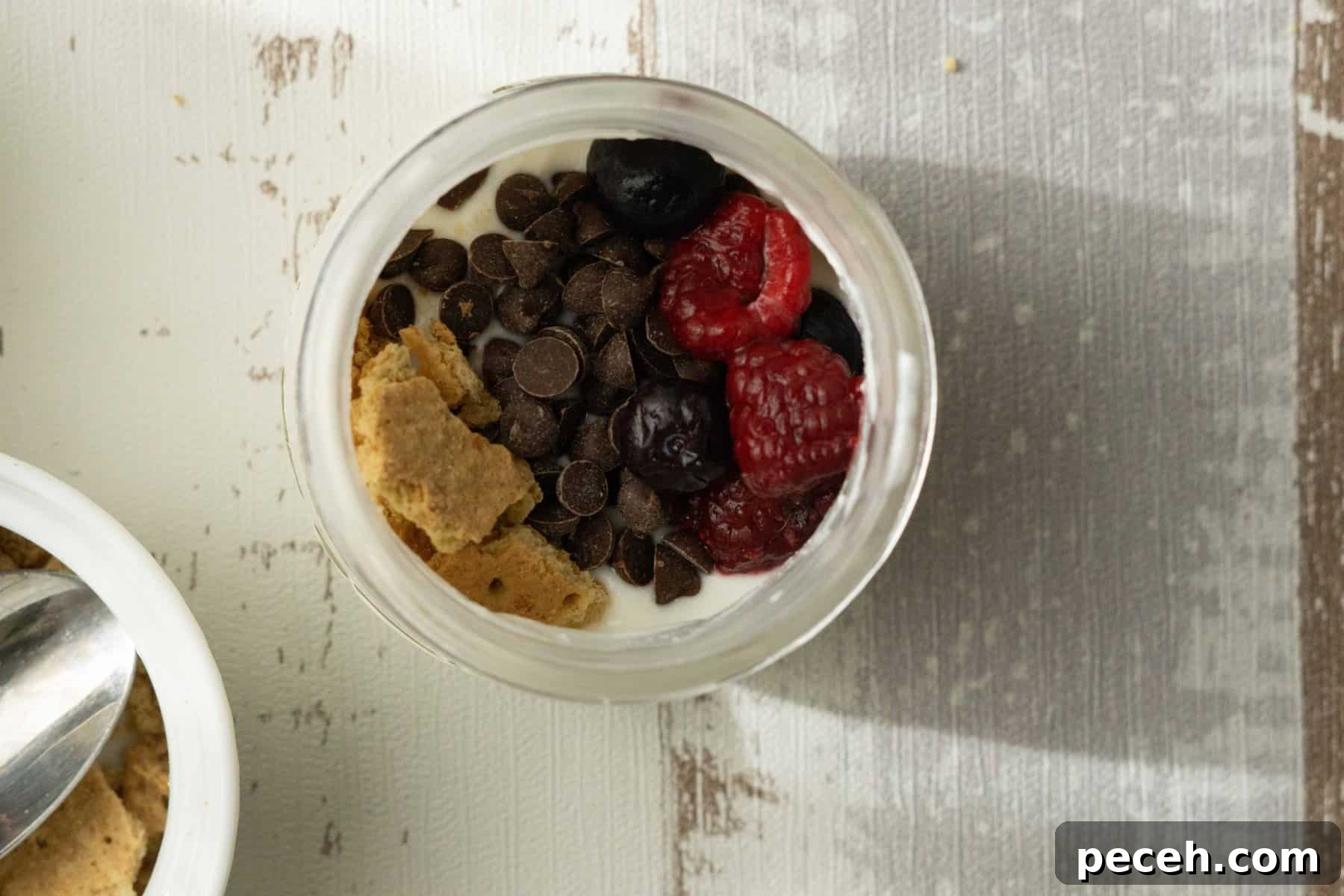 greek yogurt in jar with toppings