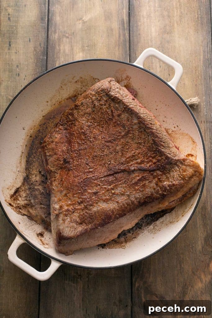 pan-seared brisket in a large dutch oven