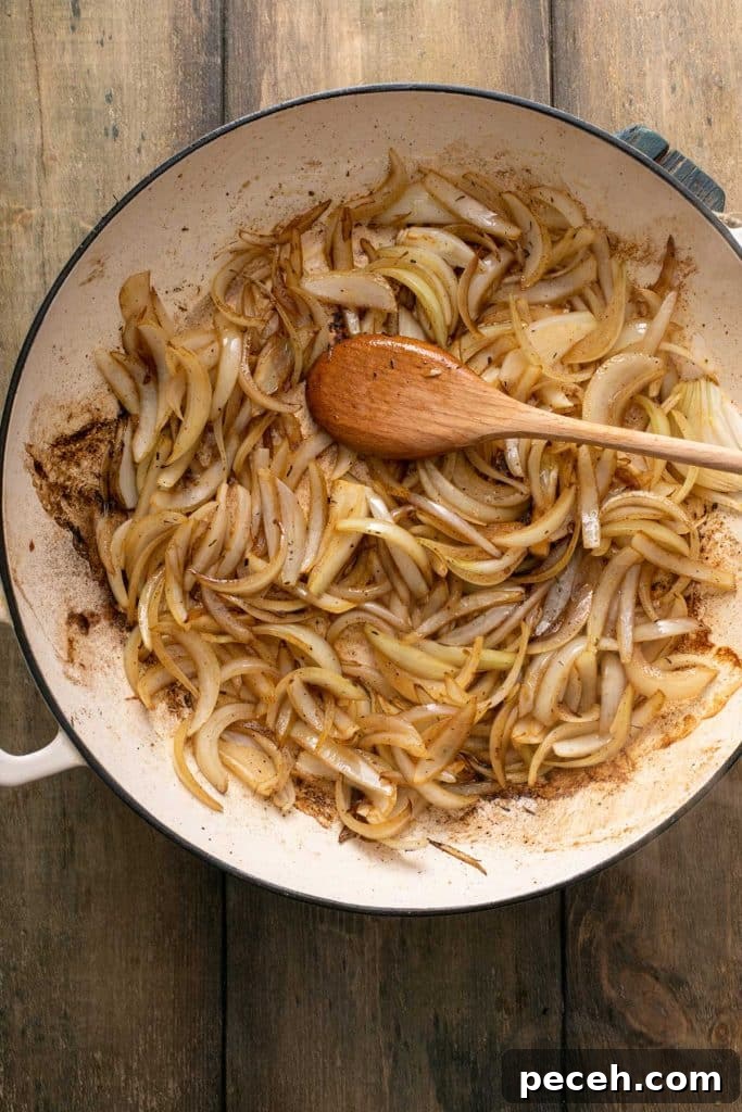 golden brown cooked onion in a large dutch oven.
