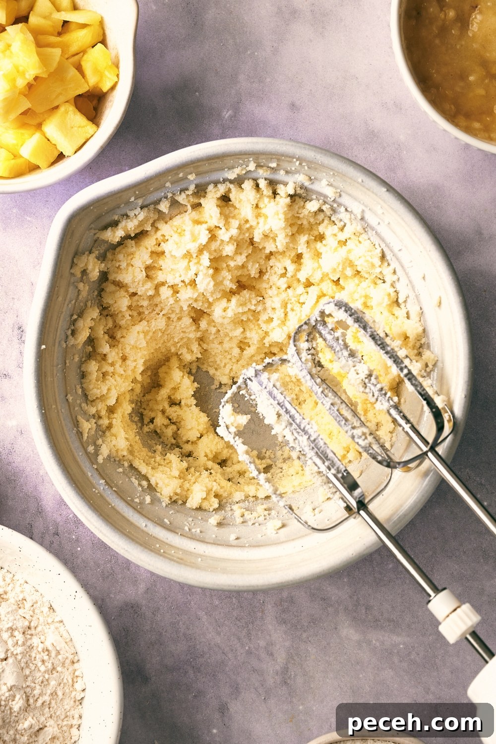 Tropical Hawaiian Banana Bread with Coconut and Macadamia Nuts 6 A mixing bowl with creamed butter and sugar.