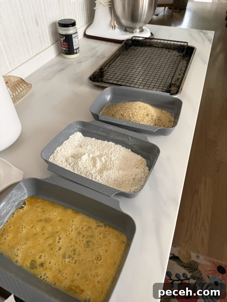 Pickle-Brined Fried Pork Chops with Creamy Dill-Dijon Gravy 6 The breading station, with pans of egg, flour, and breadding