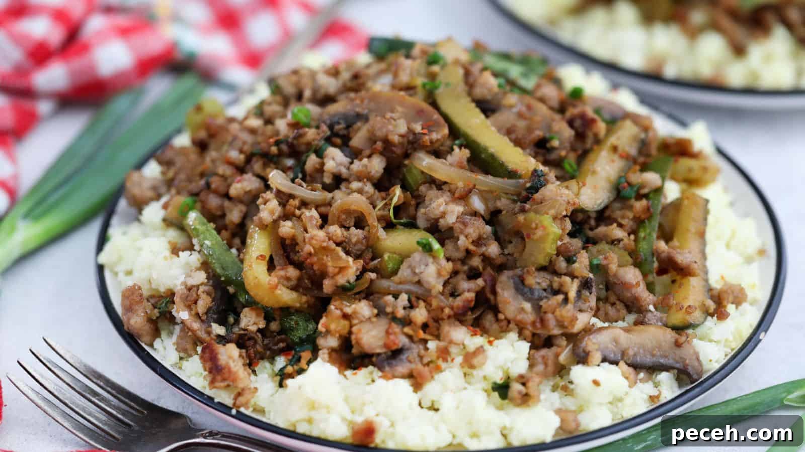 Ground meat and vegetables served over mashed potatoes.