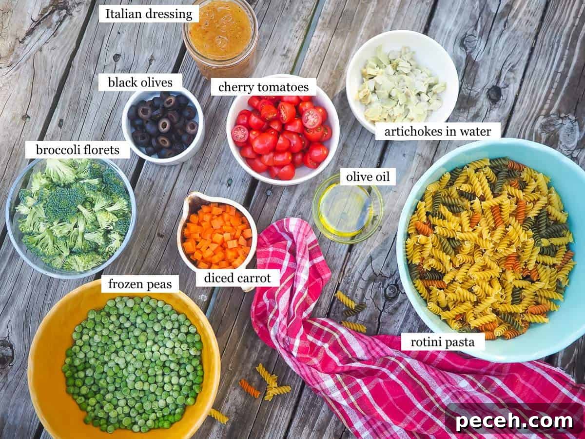 The ingredients in pasta salad, laid out and labeled.