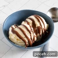 easy keto chocolate sauce drizzled on ice cream