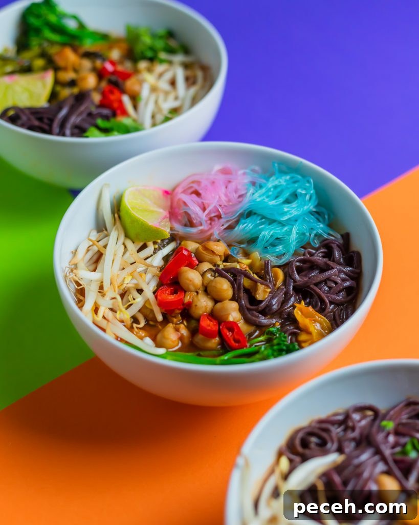 Bowls of soup on colourful backdrop