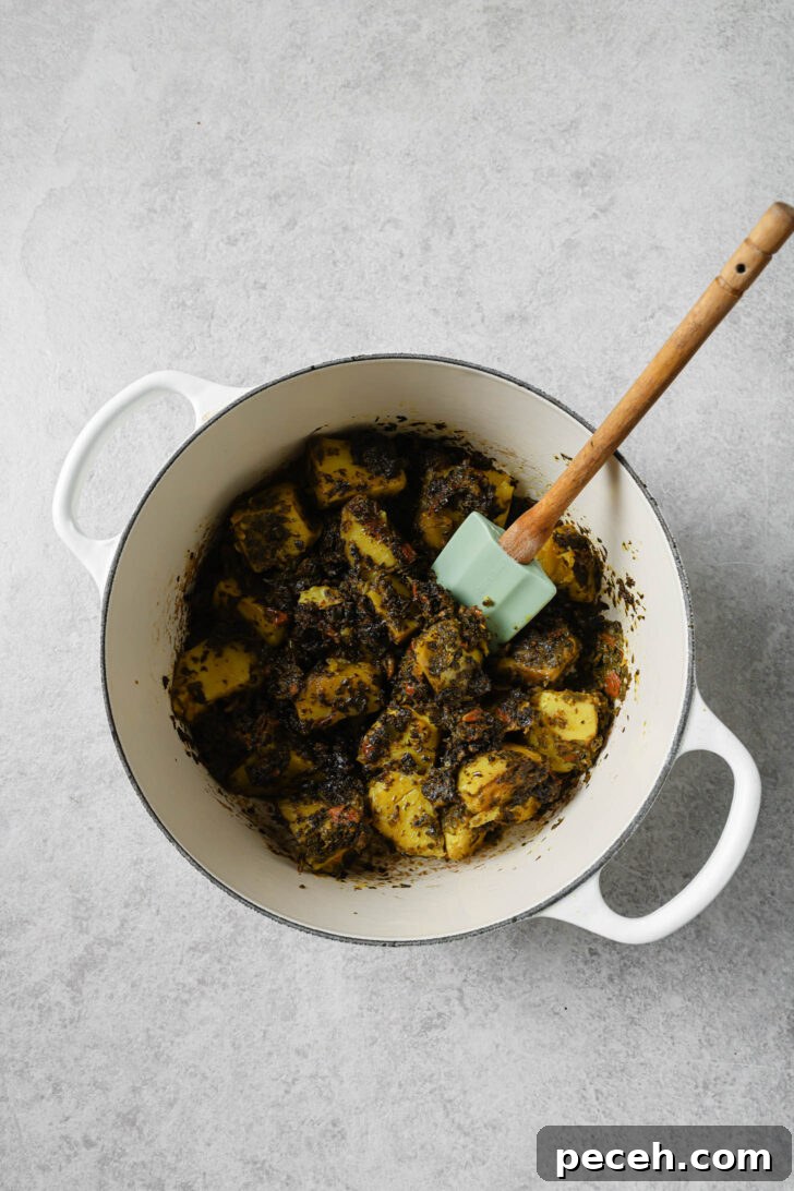 Authentic Aloo Methi (Potato & Fenugreek Leaves) Recipe from Mom-in-Law 13 Aloo Methi in a dutch oven.