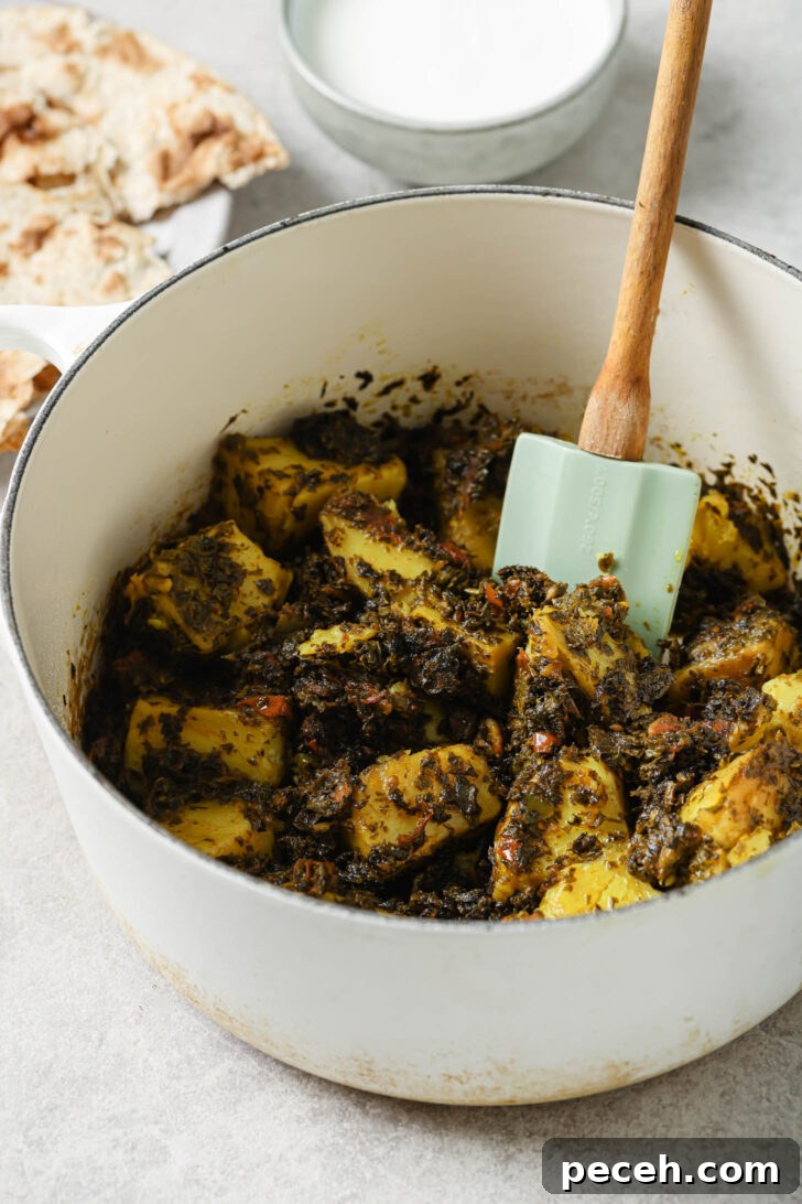 Authentic Aloo Methi (Potato & Fenugreek Leaves) Recipe from Mom-in-Law 14 Aloo Methi in a dutch oven.