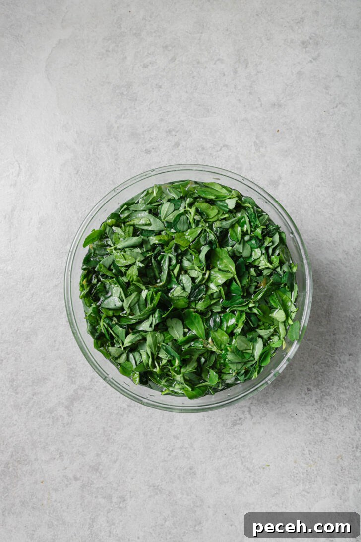 Authentic Aloo Methi (Potato & Fenugreek Leaves) Recipe from Mom-in-Law 6 Fenugreek leaves soaked in a bowl of water