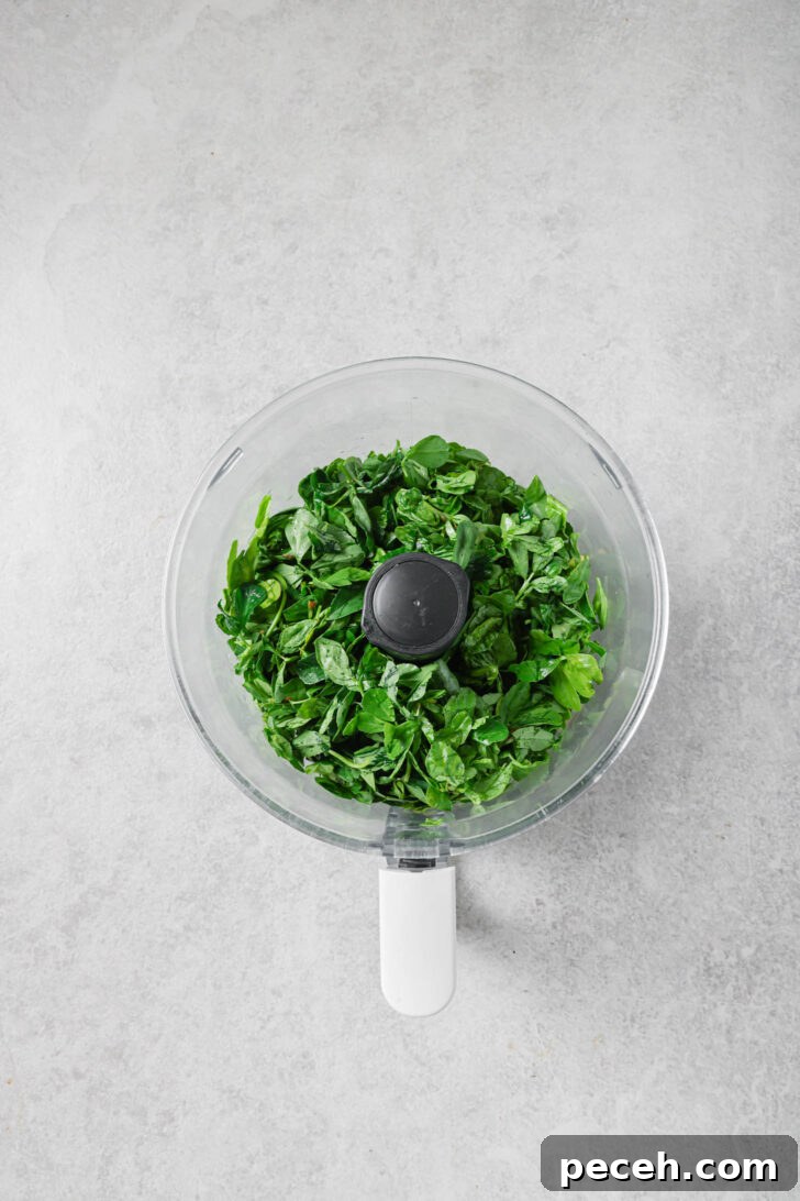 Authentic Aloo Methi (Potato & Fenugreek Leaves) Recipe from Mom-in-Law 8 Fenugreek leaves in a food processor