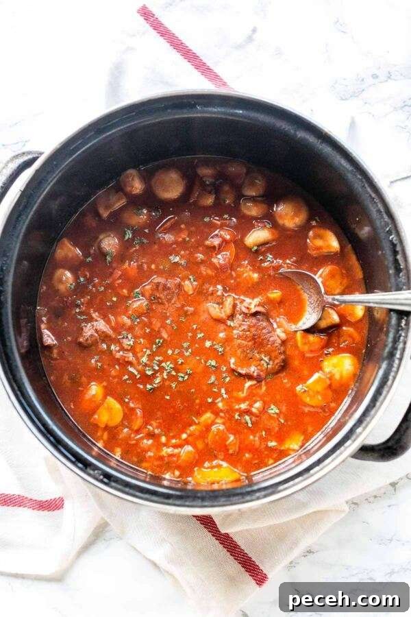 Looking for the best French beef stew? Take at this beef bourguignon recipe made with the Crockpot Express pressure cooker. Quick and simple dinner recipe.