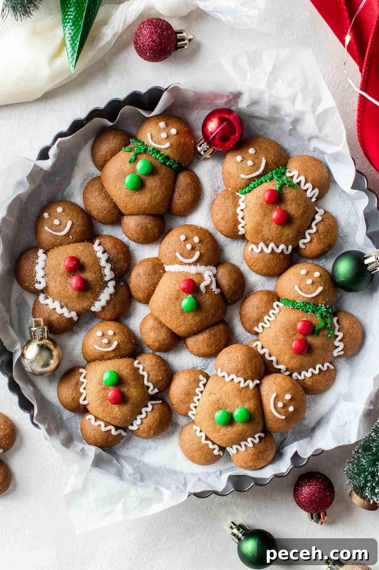 decorated chubby gingerbread men in serving plate