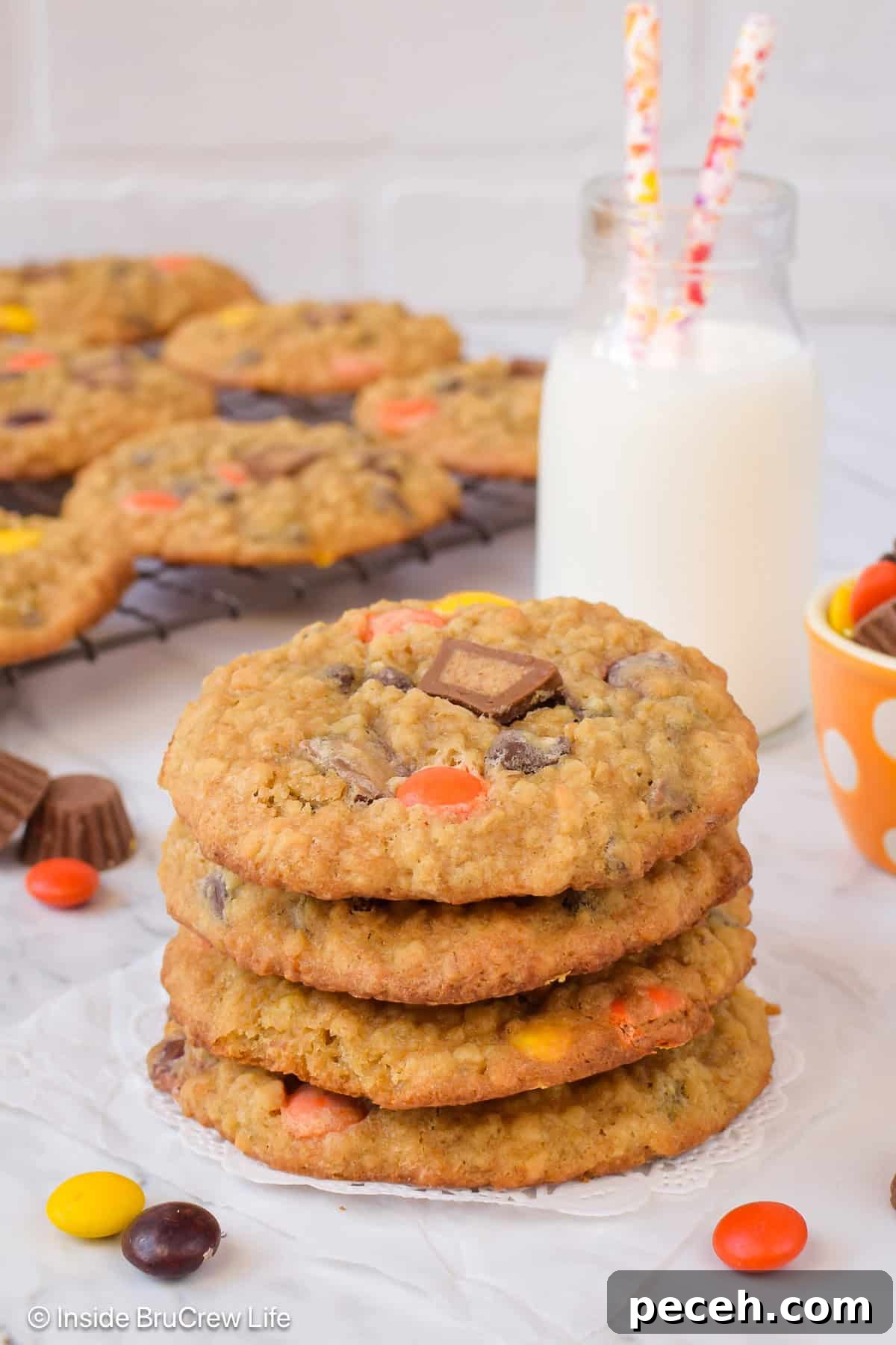 Peanut Butter Banana Oatmeal Cookies Recipe for Chewy Bites 2 A stack of chewy peanut butter banana oatmeal cookies made with Reese's candies.