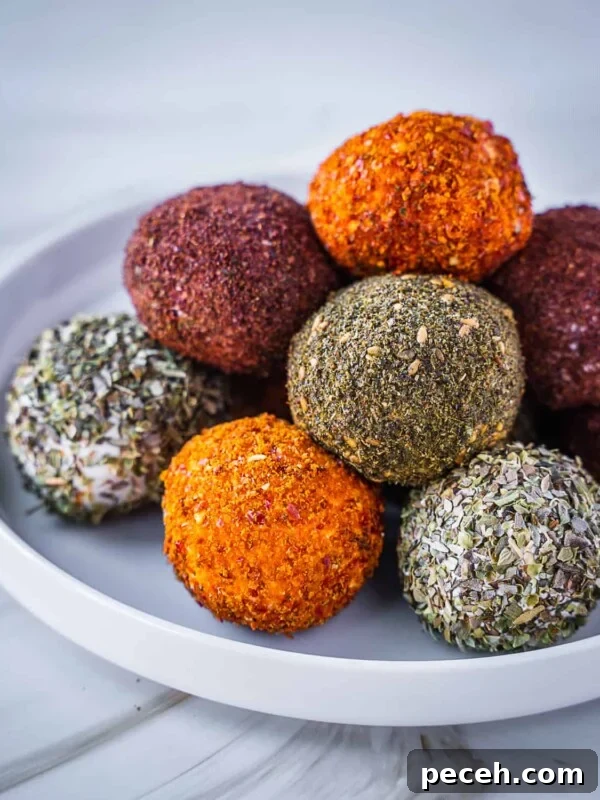 Labneh balls stacked on a plate.