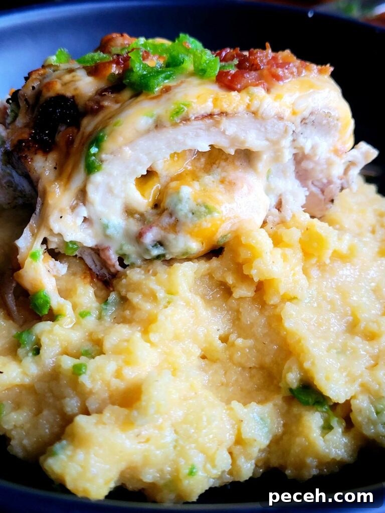 jalapeno popper chicken on a bed of polenta