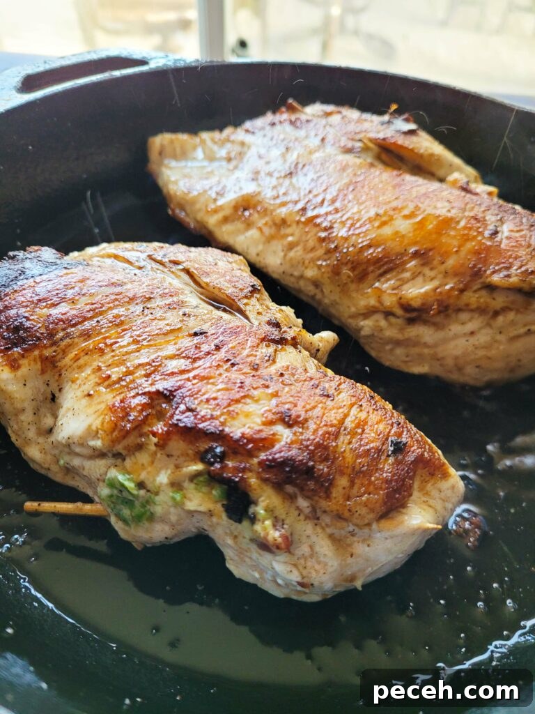 seared chicken breasts in a pan
