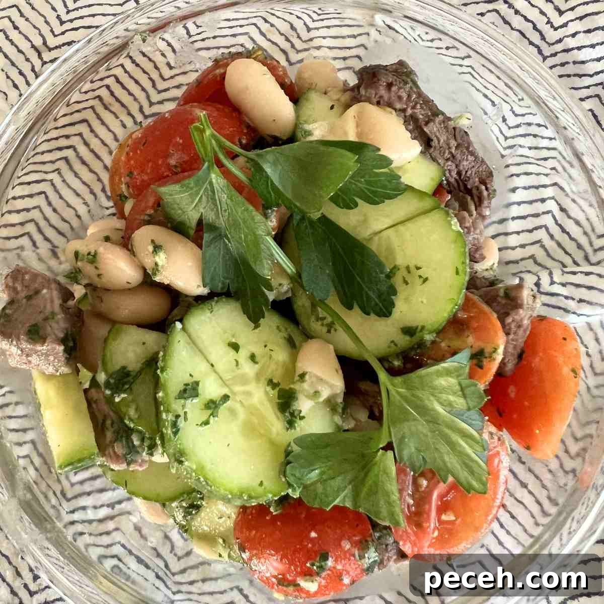 Chimichurri Steak Salad with Fresh Vegetables and Lime Dressing 2 Viral Steak Chimichurri salad with dense bean salad.