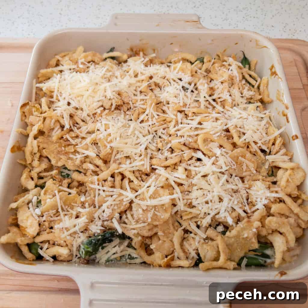 Crispy Green Bean Casserole in the Air Fryer (Also Oven) 5 Air fryer green bean casserole step 2 top with french fried onions and parmesan cheese and do final bake.