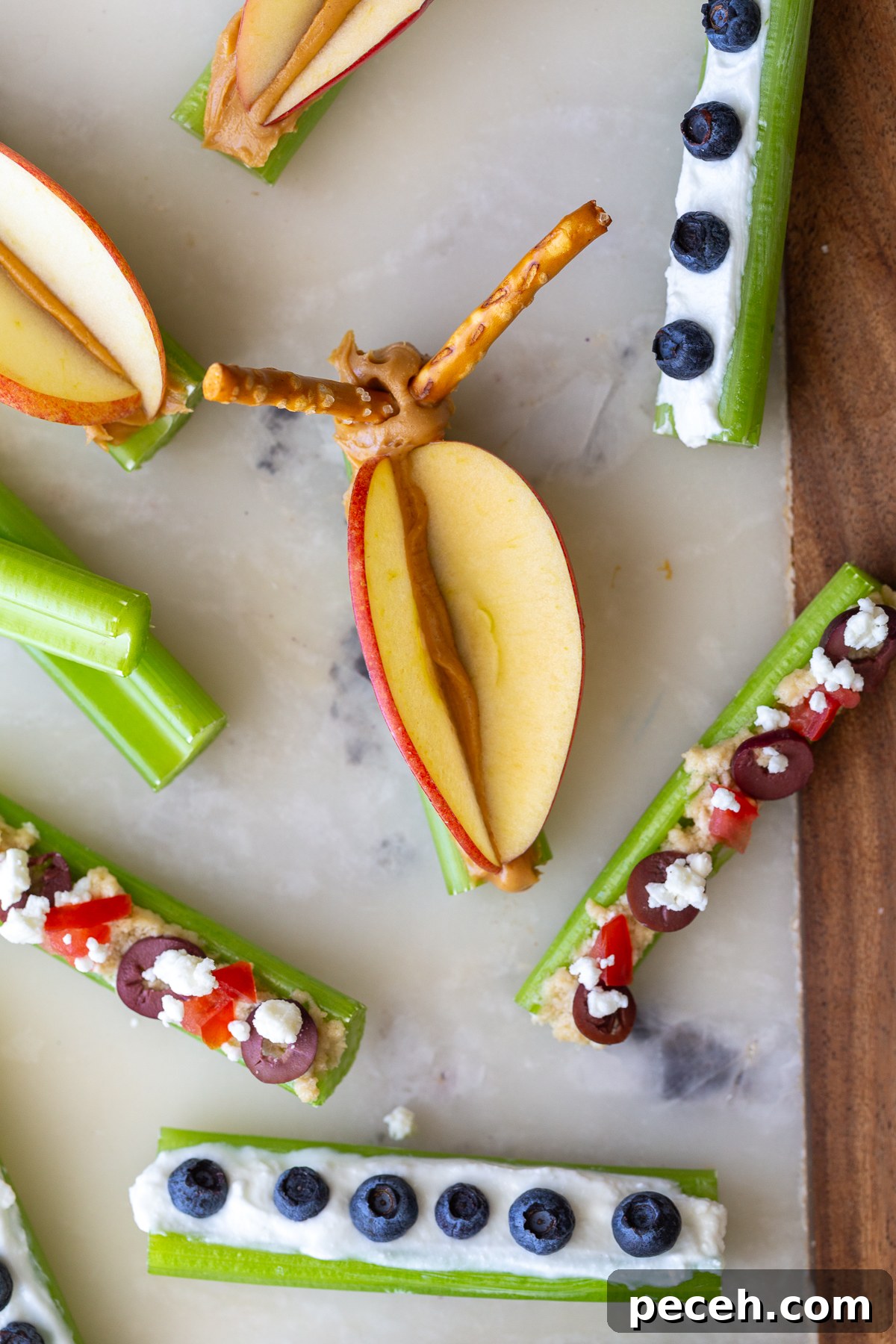 Ants on a Log: 3 Fun Variations for Snacks and Parties 6 Peanut butter butterfly ant on a log