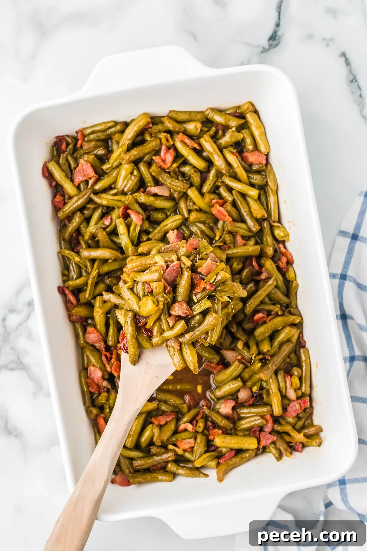 Quick and Flavorful Canned Green Beans Recipe 8 Close-up of glossy baked green beans ready to serve