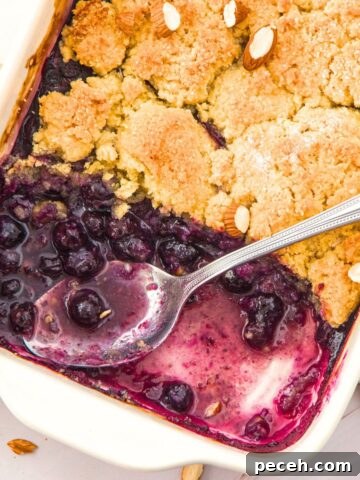 Half-eaten almond flour blueberry cobbler