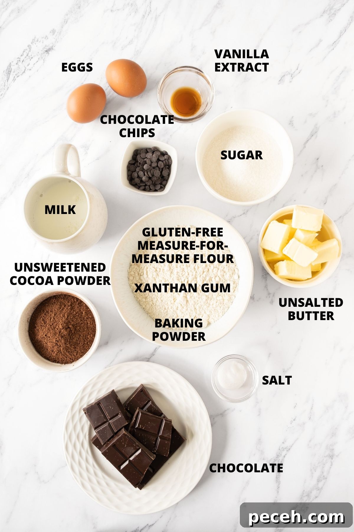 Gluten-Free Chocolate Muffins Recipe (Dairy-Free Option) Ingredients for gluten-free chocolate muffins recipe laid out on marble board.