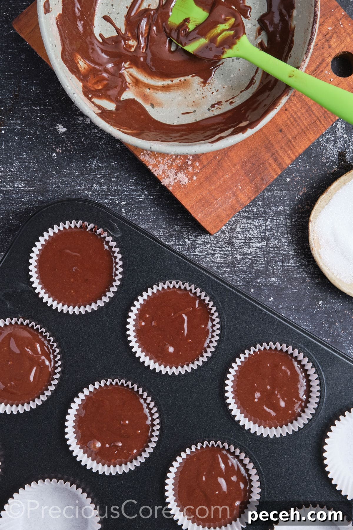 Decadent Chocolate Cupcakes with Silky Chocolate Frosting 11 Chocolate cupcake batter in muffin pan ready for baking.
