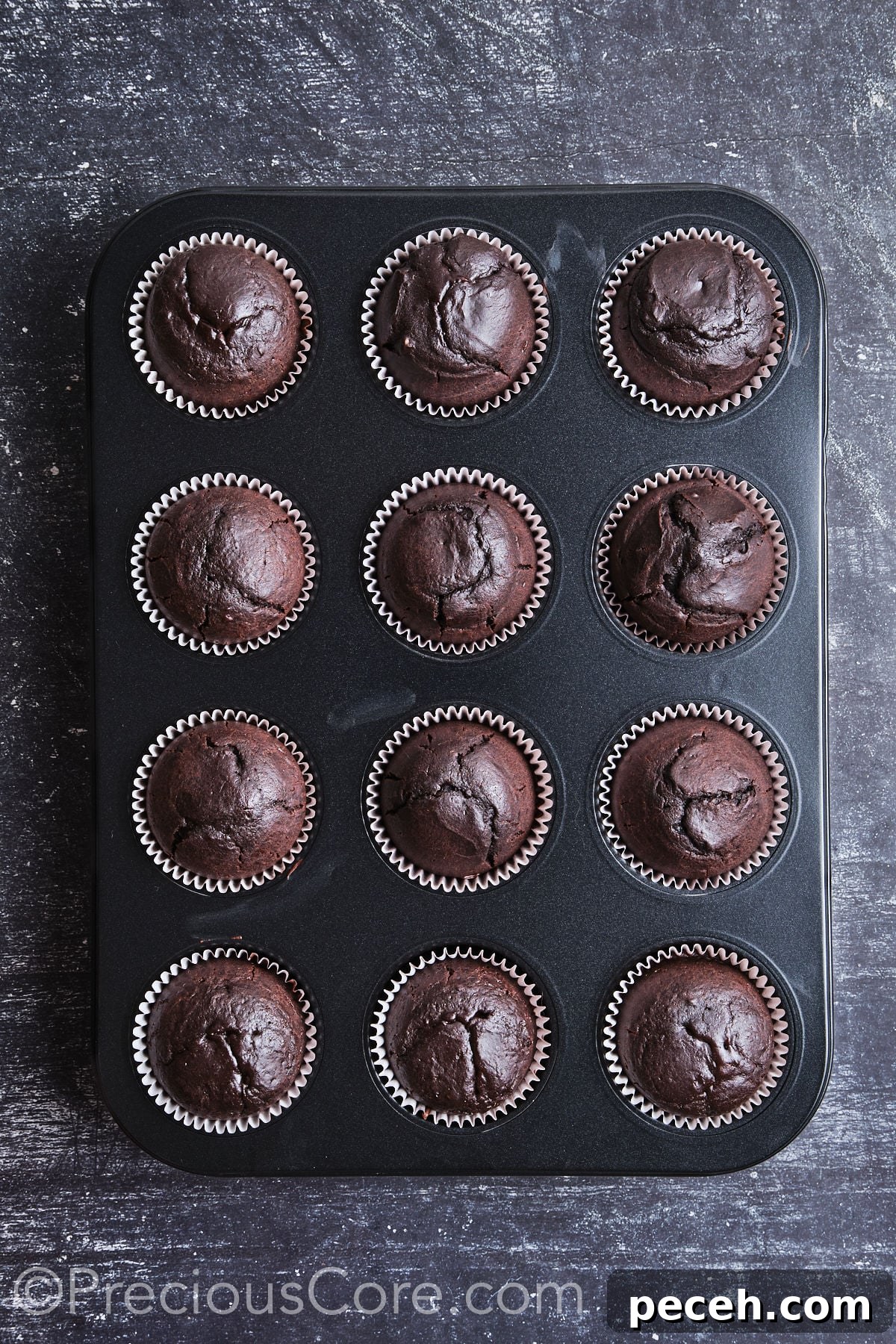 Decadent Chocolate Cupcakes with Silky Chocolate Frosting 12 Freshly baked cupcakes.