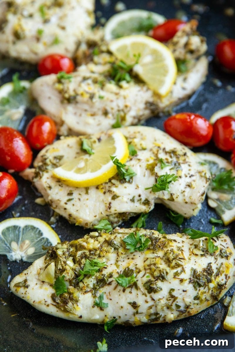 Greek Lemon and Oregano Chicken Breasts 3 casserole dish with Greek chicken inside
