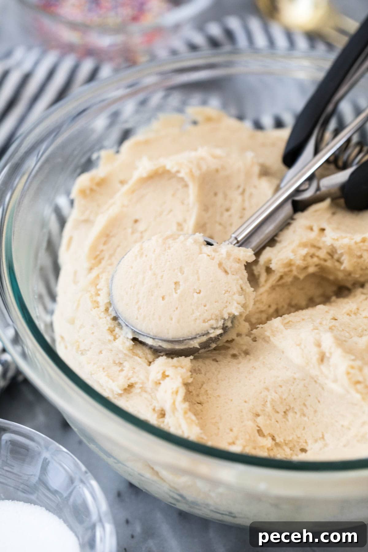 Soft and Chewy Cream Cheese Cookie Recipe for Perfect Bakes 4 cookie dough in glass bowl with scoop