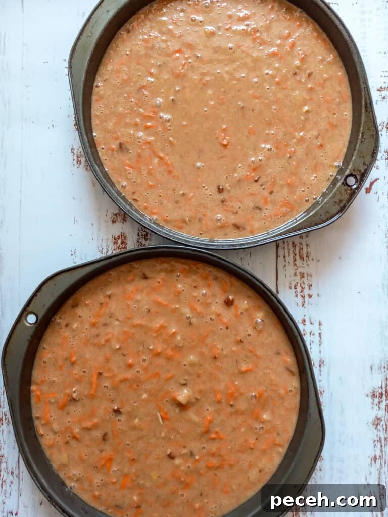 Amish Pineapple Carrot Cake with Pecans – Traditional Recipe 4 carrot cake batter in pans ready to bake.
