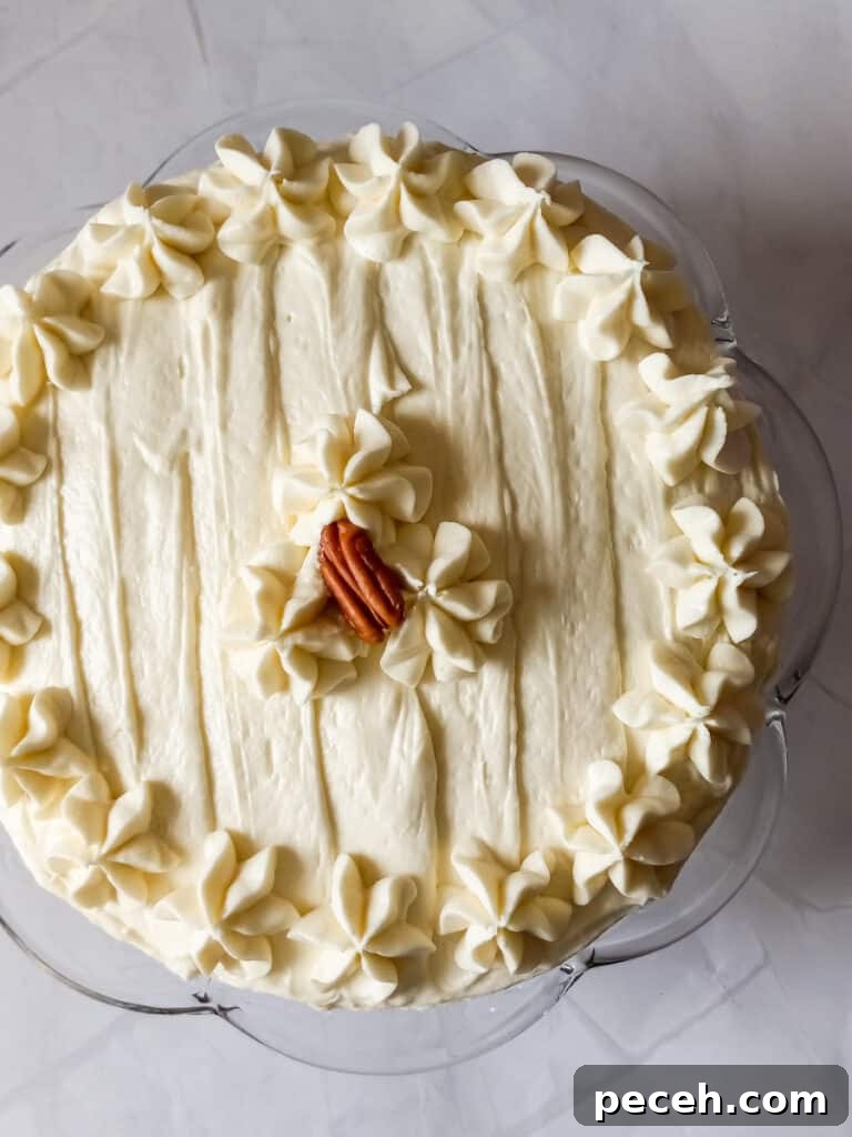 Amish Pineapple Carrot Cake with Pecans – Traditional Recipe 7 carrot cake covered in cream cheese frosting.