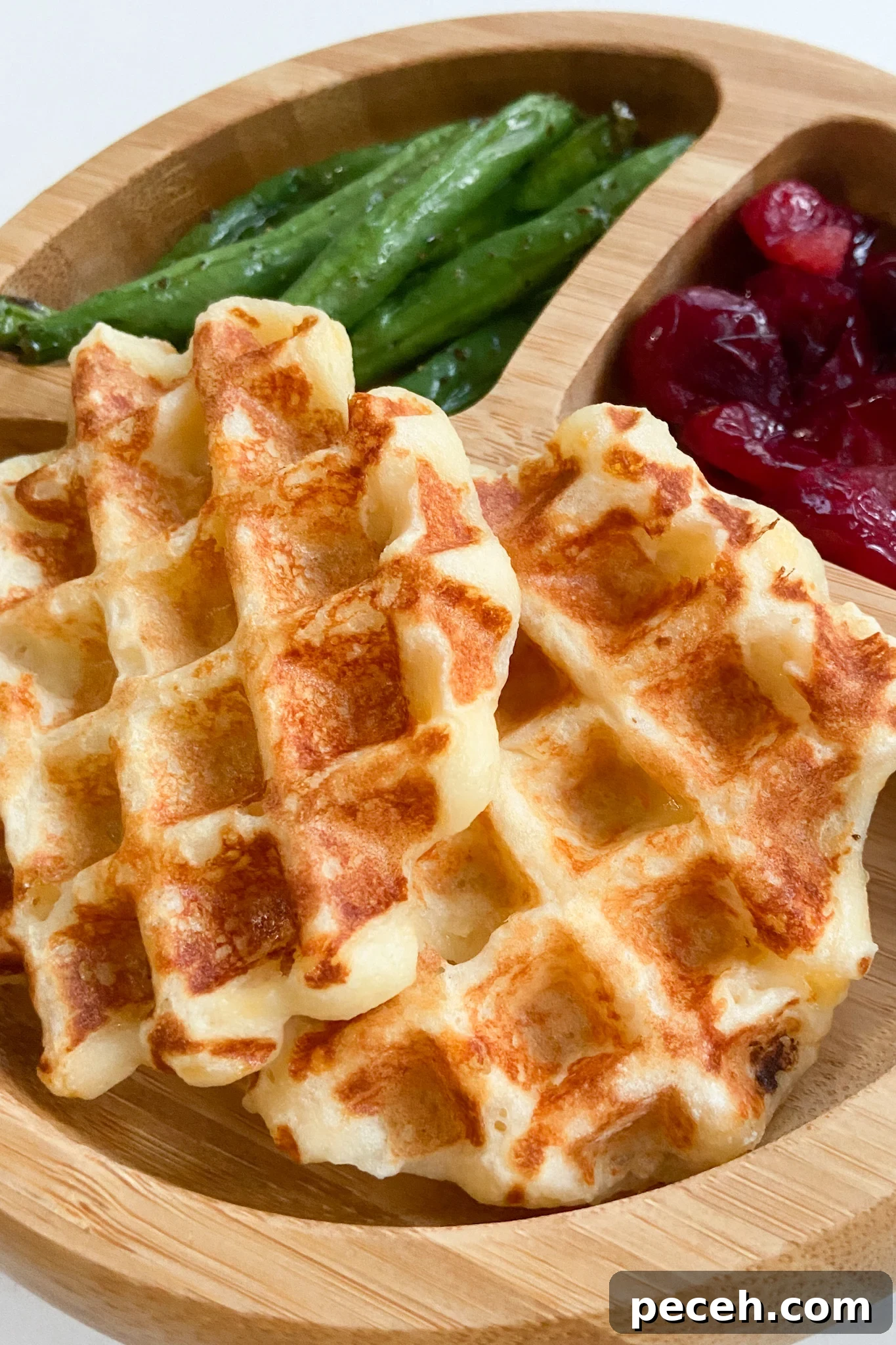 Waffle Recipes for Babies and Toddlers: 10+ Nutritious Ideas 11 Mashed potato waffles served with green beans and mashed potatoes.