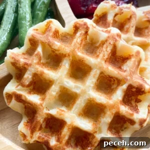 Mashed potato waffles served with green beans and mashed potatoes.
