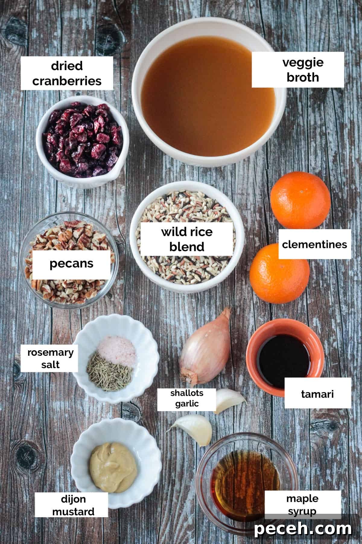 Ingredients for Cranberry Pecan Wild Rice Salad. Recipe ingredients arrayed in individual bowls.