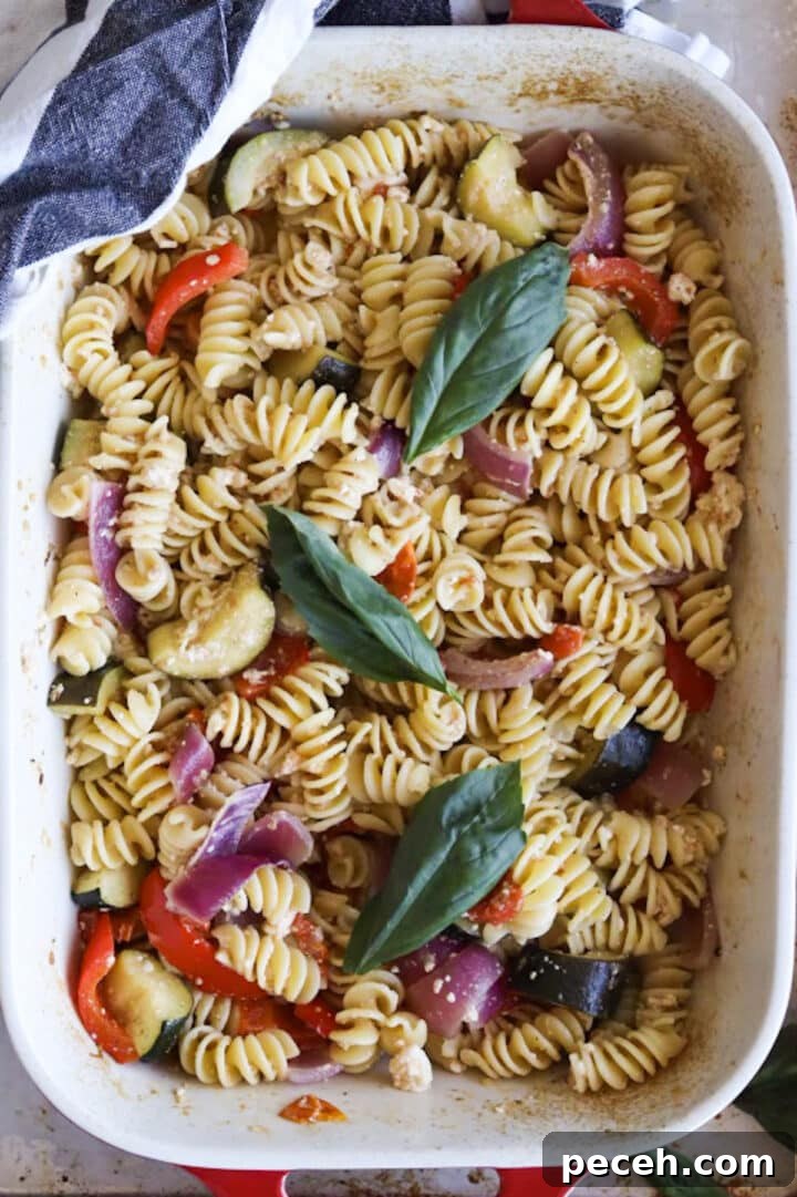 Roasted Feta Pasta with Extra Vegetables 3 Baking dish containing baked feta pasta with more vegetables