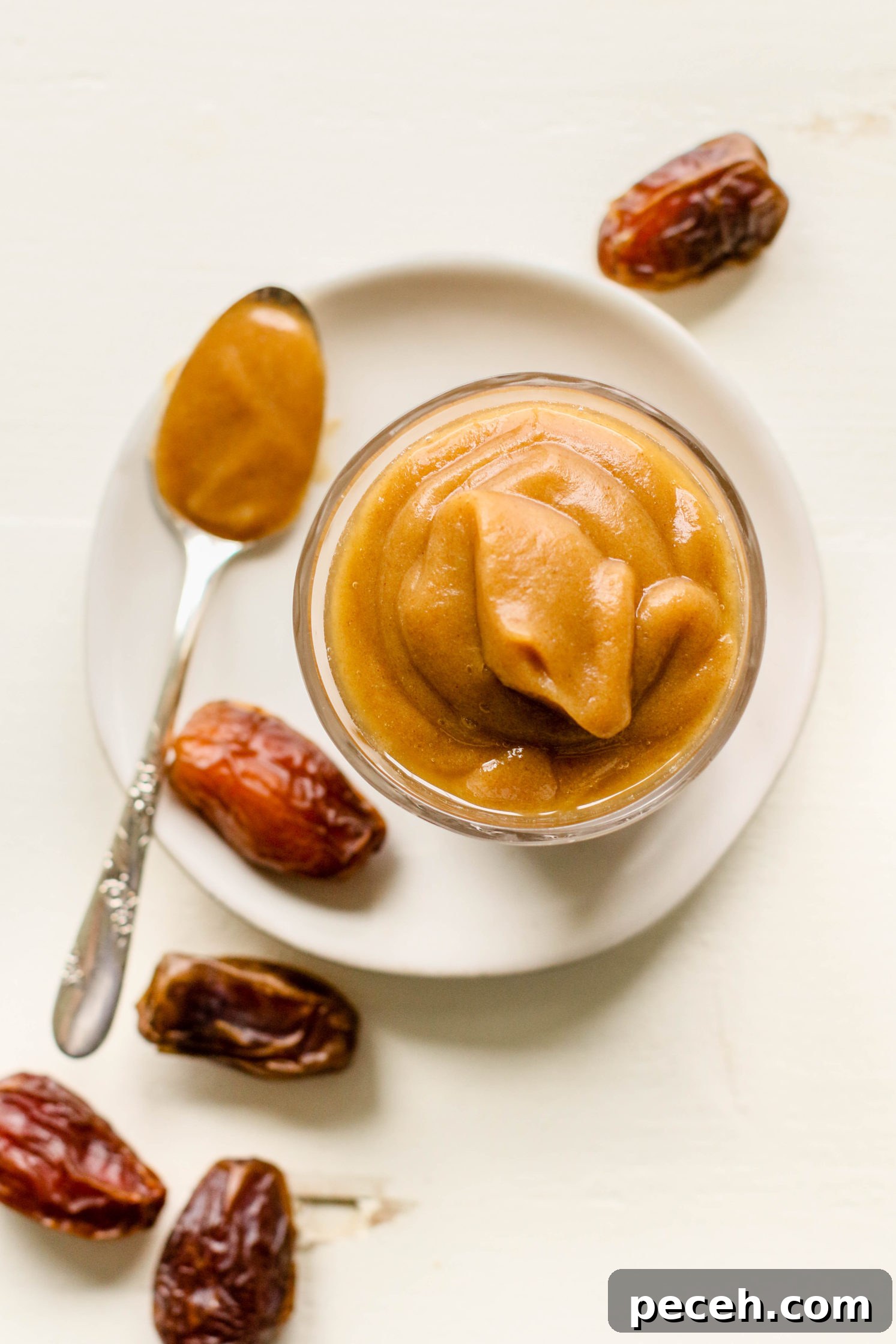 Apple Pie Avocado Toast Recipe: Cinnamon Maple Fall Breakfast 3 date caramel in glass jar with dates and spoon