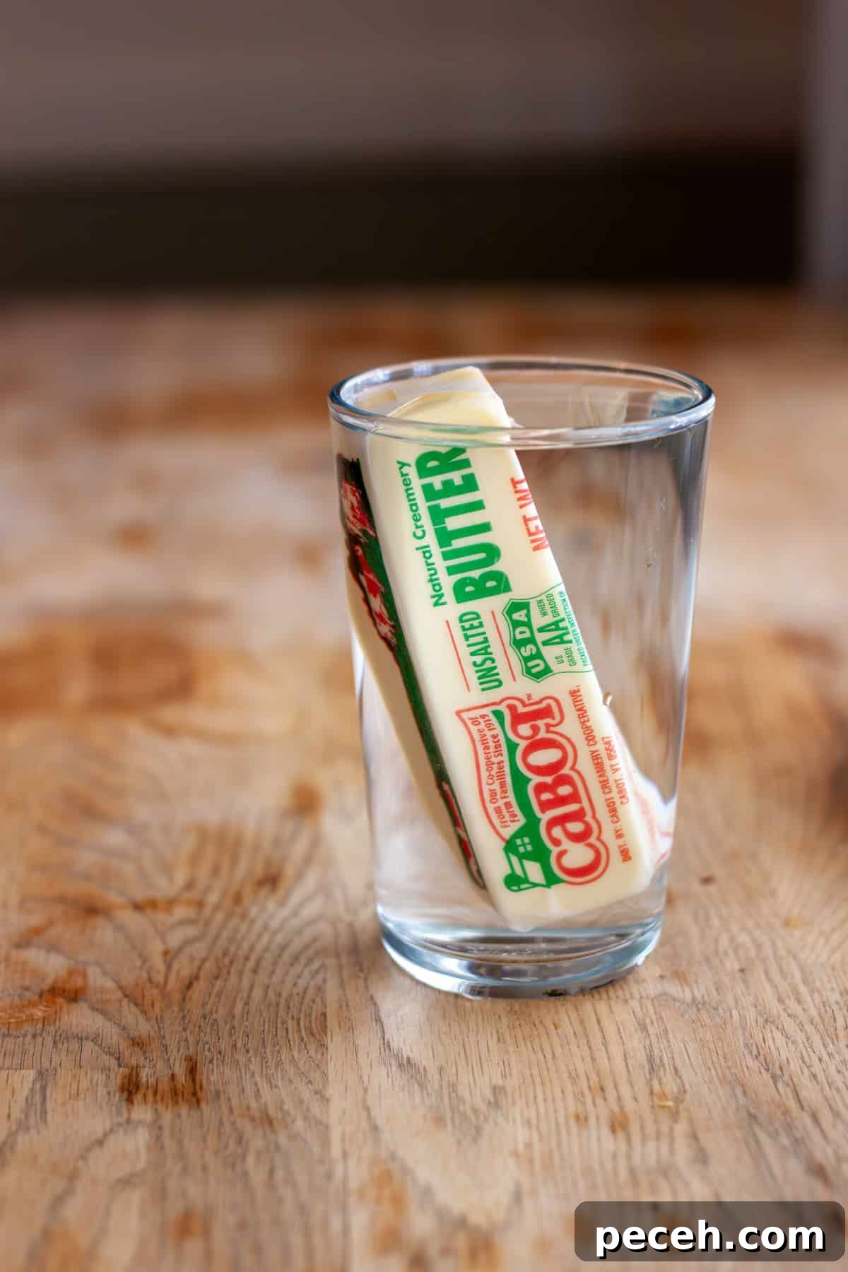 Savory Miso Butter Recipe for Bread, Veggies, and Steak 10 A stick of butter in a glass of warm water to help bring the butter to room temperature.