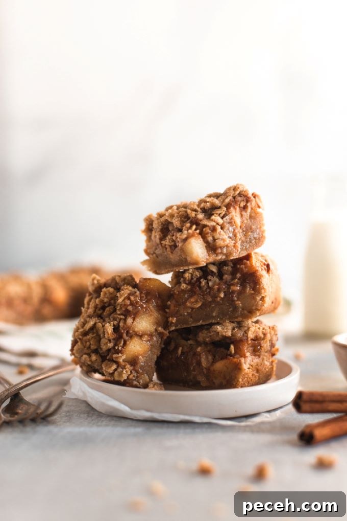 Apple Crisp Blondie Bars Recipe with Cinnamon Oat Topping 4 Apple filling in pan