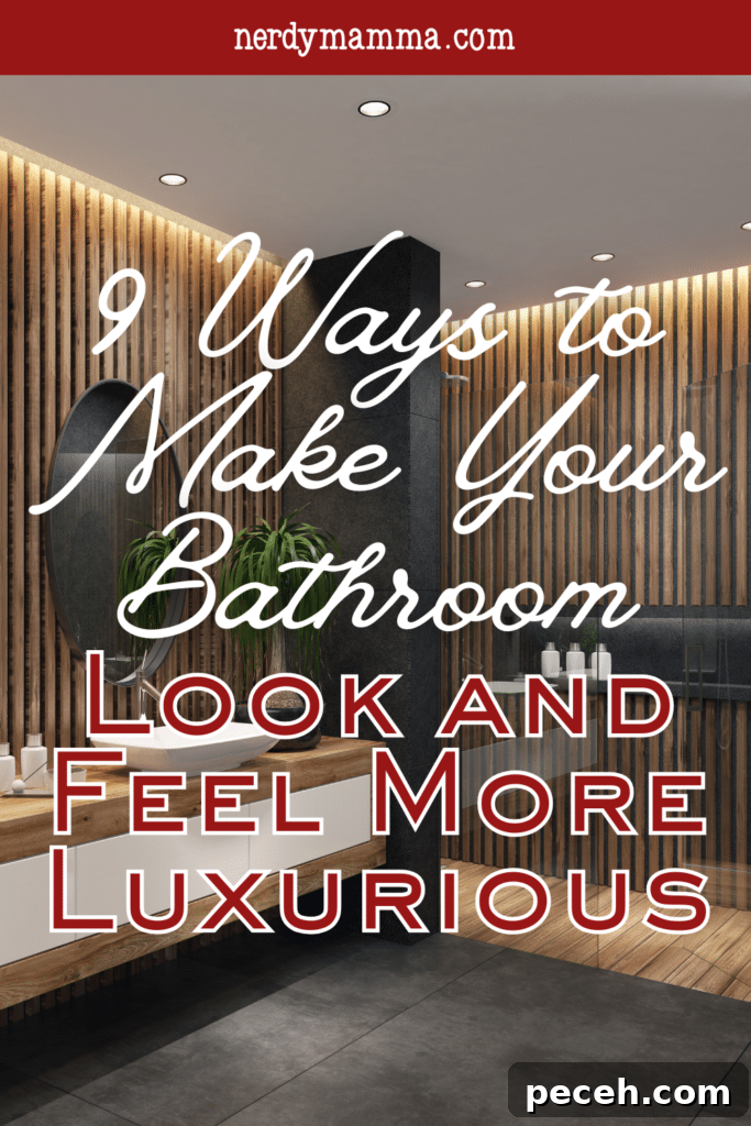 9 Ways to Make Your Bathroom Feel Luxurious and Stylish 4 A stylish bathroom with warm wood slat walls, a round mirror, sleek vanity, and soft lighting creating a high-end feel.