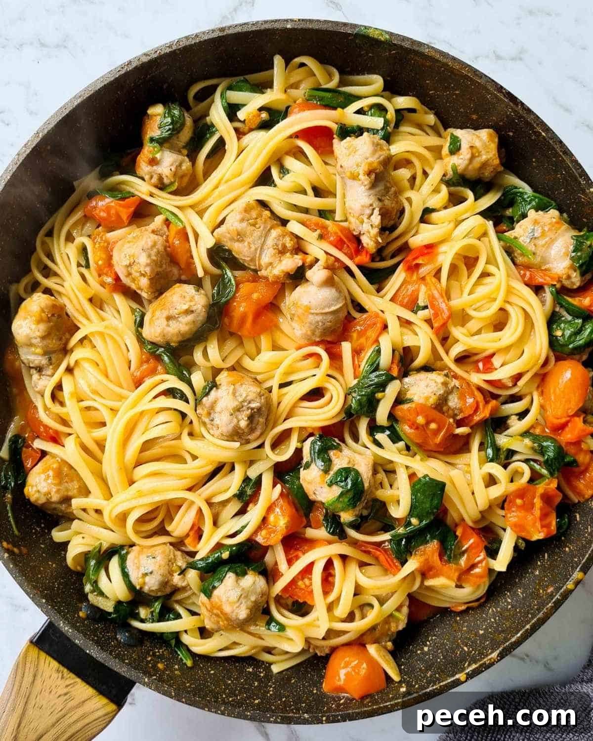 Spicy Italian Sausage Pasta Recipe for Quick Weeknight Dinners 8 A large pan of pasta