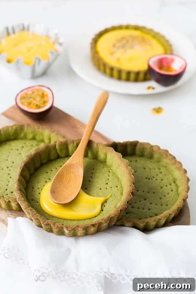 Matcha Tarts with Tangy Passion Fruit Curd 5 Filling matcha tarts with passion fruit curd filling