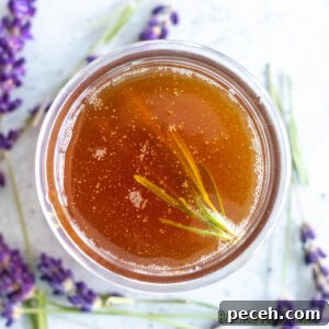 Honey Lavender Syrup Recipe for Lattes, Cocktails & Desserts 12 honey lavender syrup in small jar seen from overhead