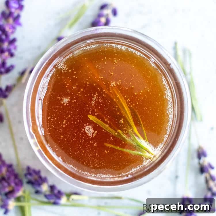Honey Lavender Syrup Recipe for Lattes, Cocktails & Desserts 3 overhead shot of honey lavender syrup in small jar
