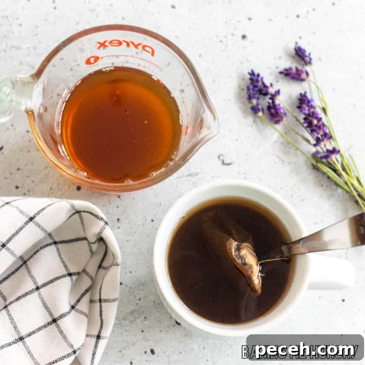 Honey Lavender Syrup Recipe for Lattes, Cocktails & Desserts 8 honey syrup next to tea